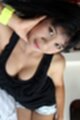 Busty Jang strips on bed and gets fucked and creampied
